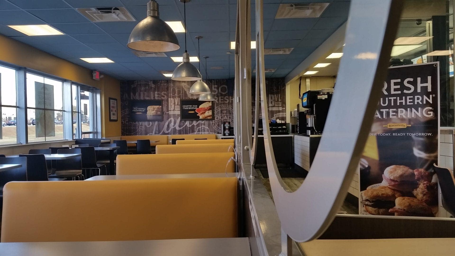 Biscuitville rebranded corporate interior with custom high resolution vinyl wall graphics and restaurant furnishing