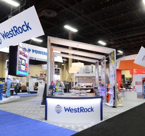 Trade show exhibit with lightweight structures and overhead lighting by Holt Environments