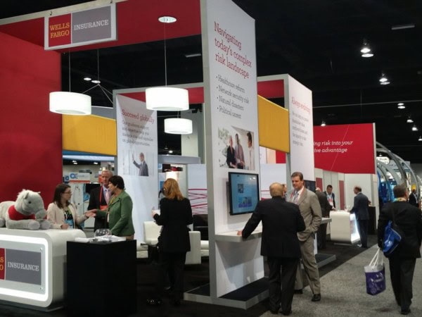 Wells Fargo large trade show exhibit with lightweight structures and custom dangle lamps and reception desk
