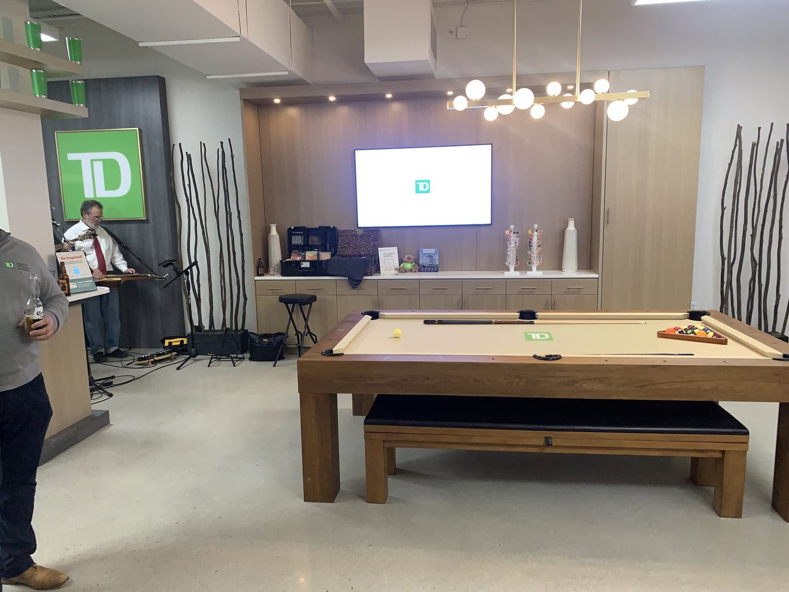TD Bank event space logo wall cabinetry pool table