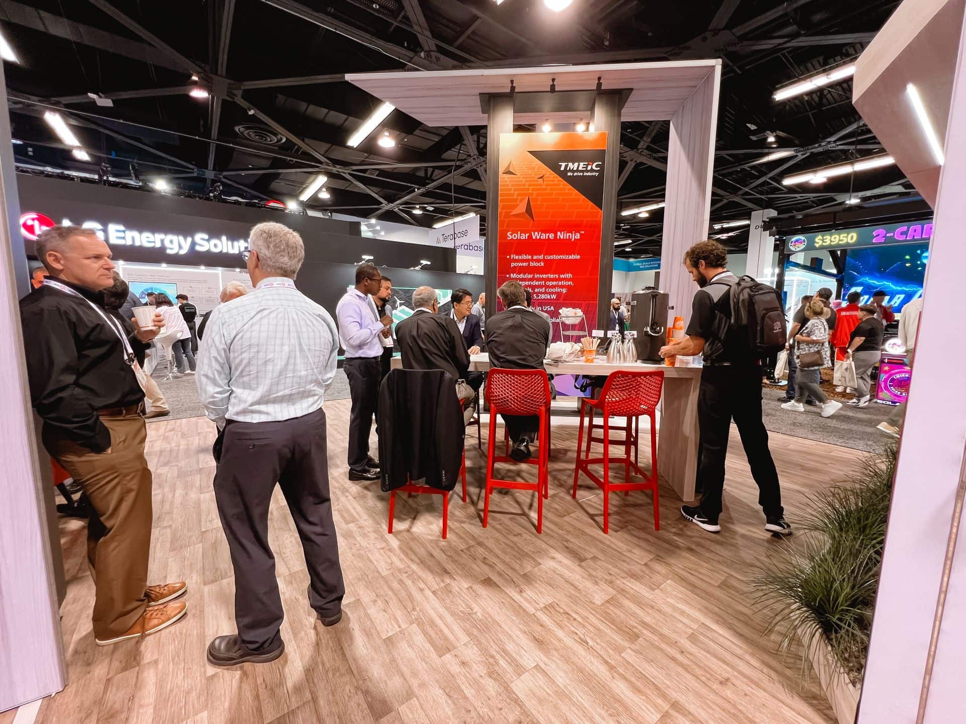 TMEIC 30x50 island trade show exhibit at RE+ 2024 - hospitality