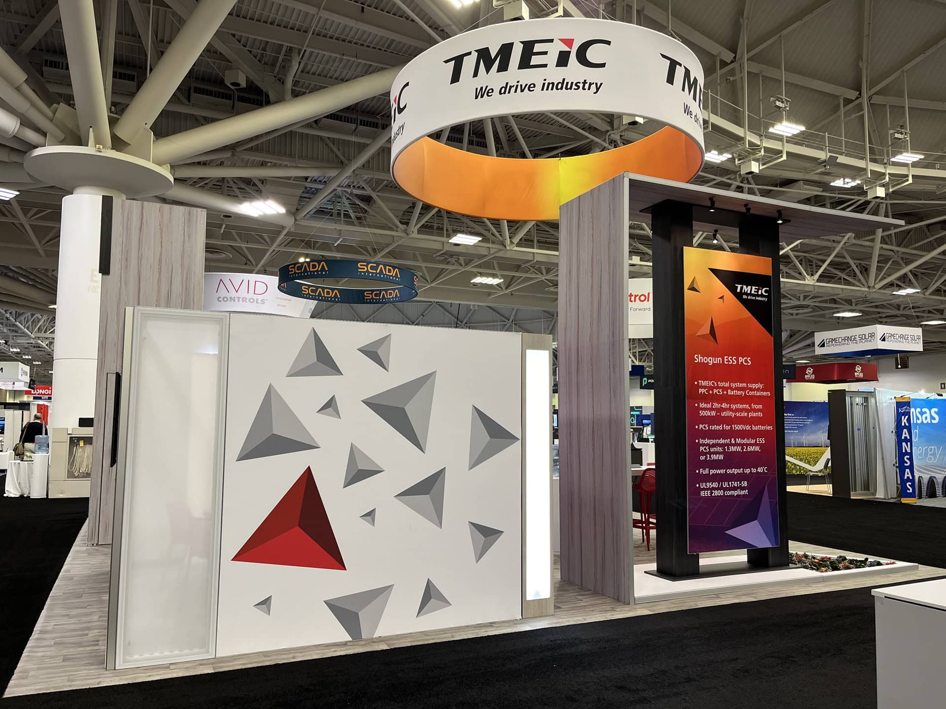 TMEIC trade show exhibit Clean Power 2024 - conference room and tower