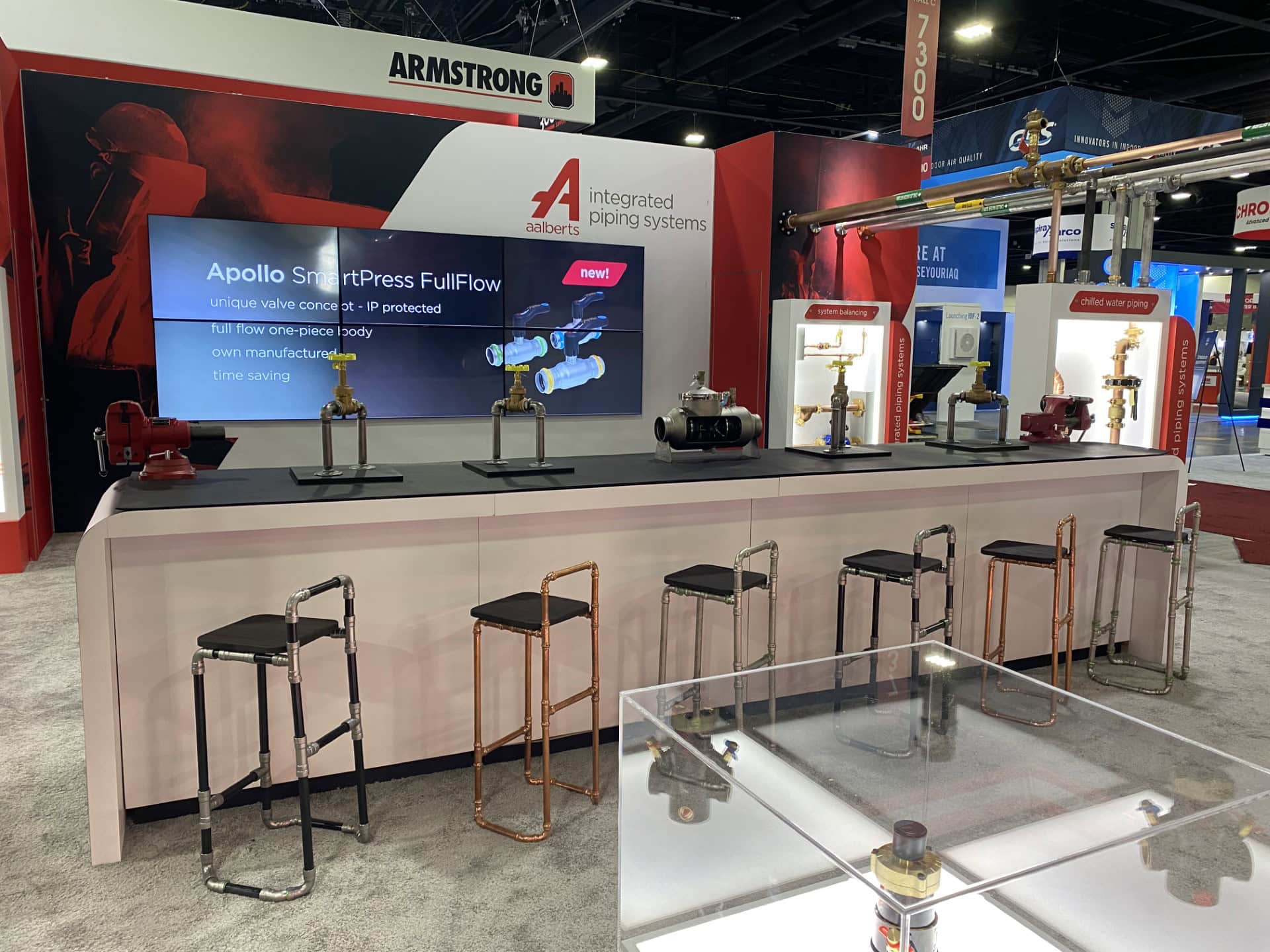 Aalberts IPS 30x40 AHR 2023 trade show exhibit - bar and video wall