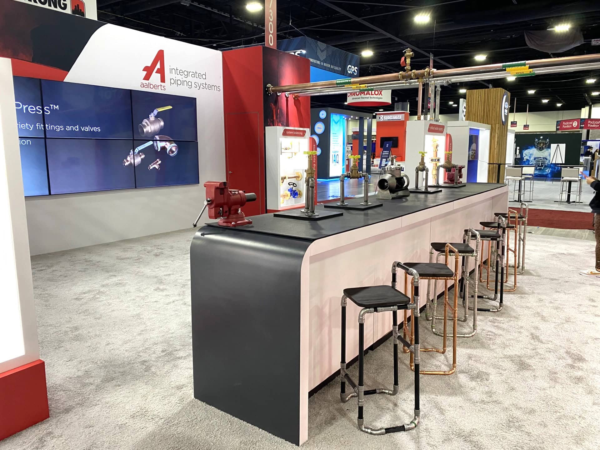 Aalberts IPS 30x40 AHR 2023 trade show exhibit - bar