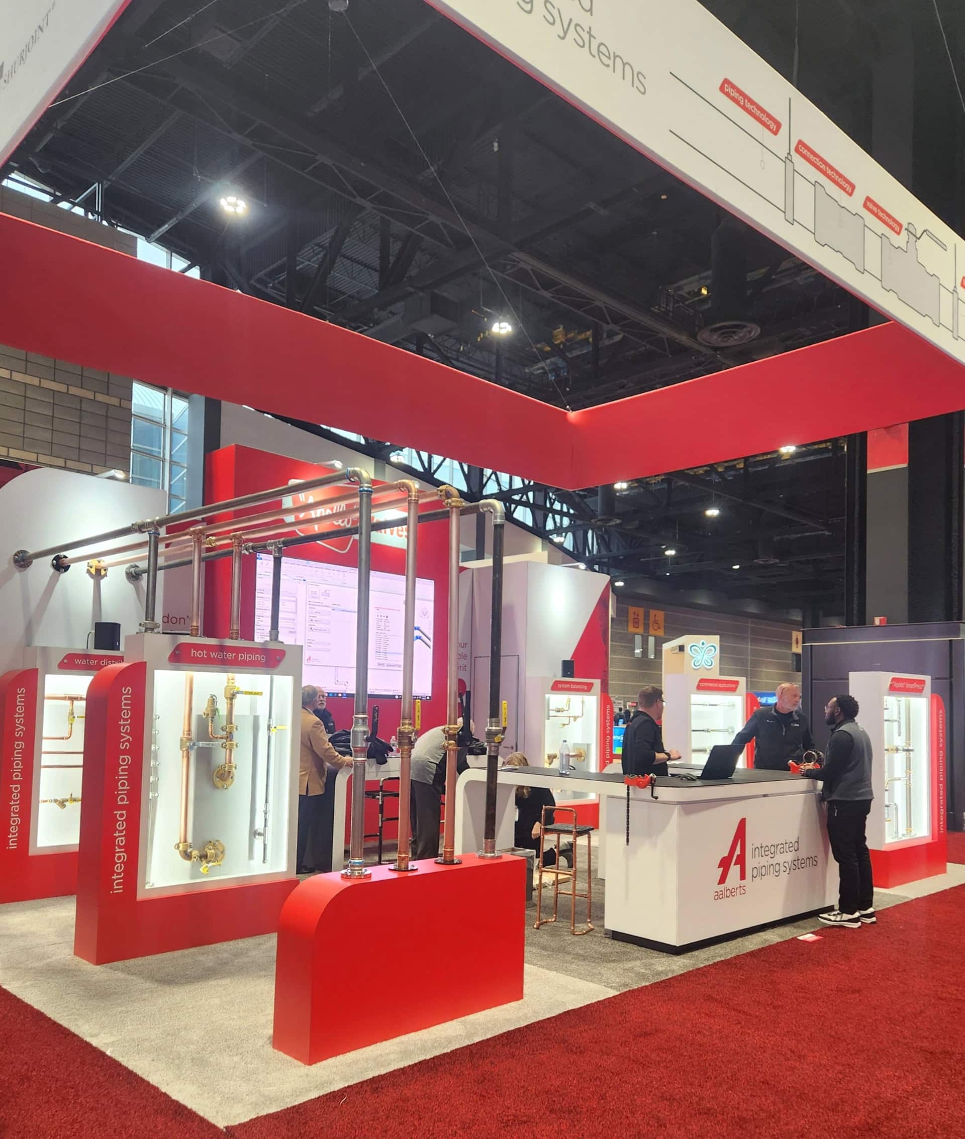 Innovative plumbing systems display at Holt Experiential trade show booth.