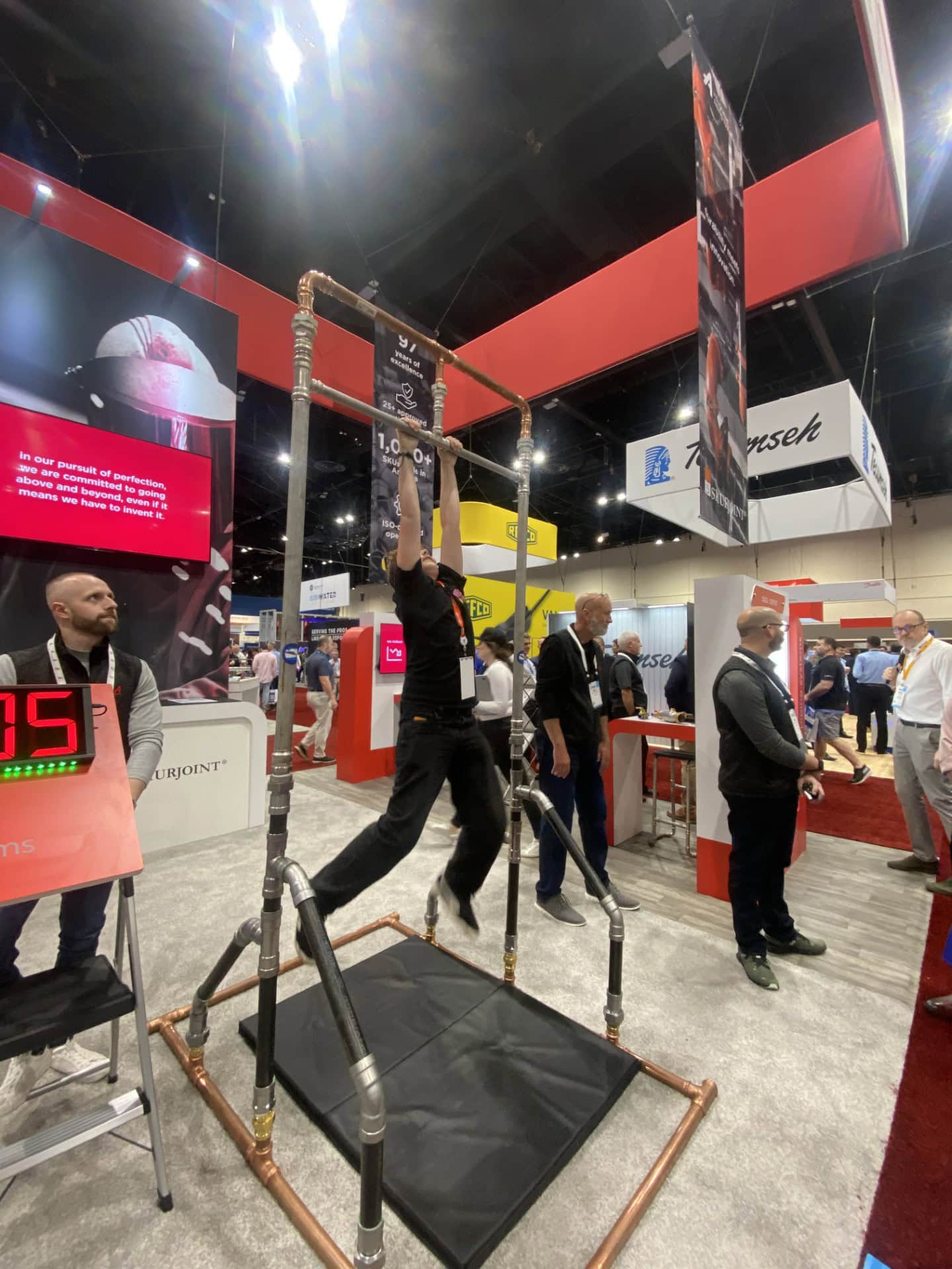 Aalberts at AHR 2025 island trade show exhibit - hang tough activity 3