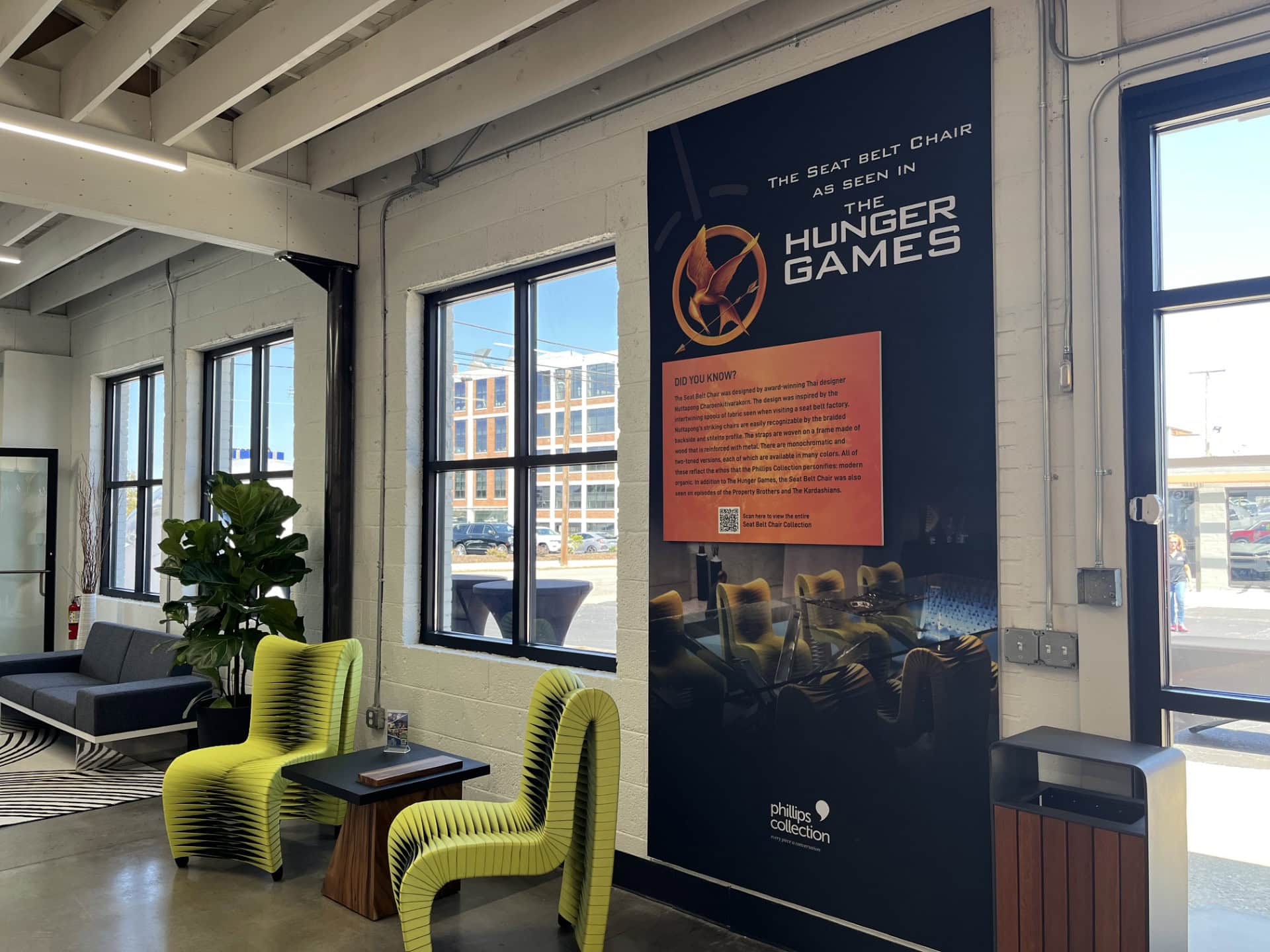 Visit High Point - Hunger Games chairs and black couch