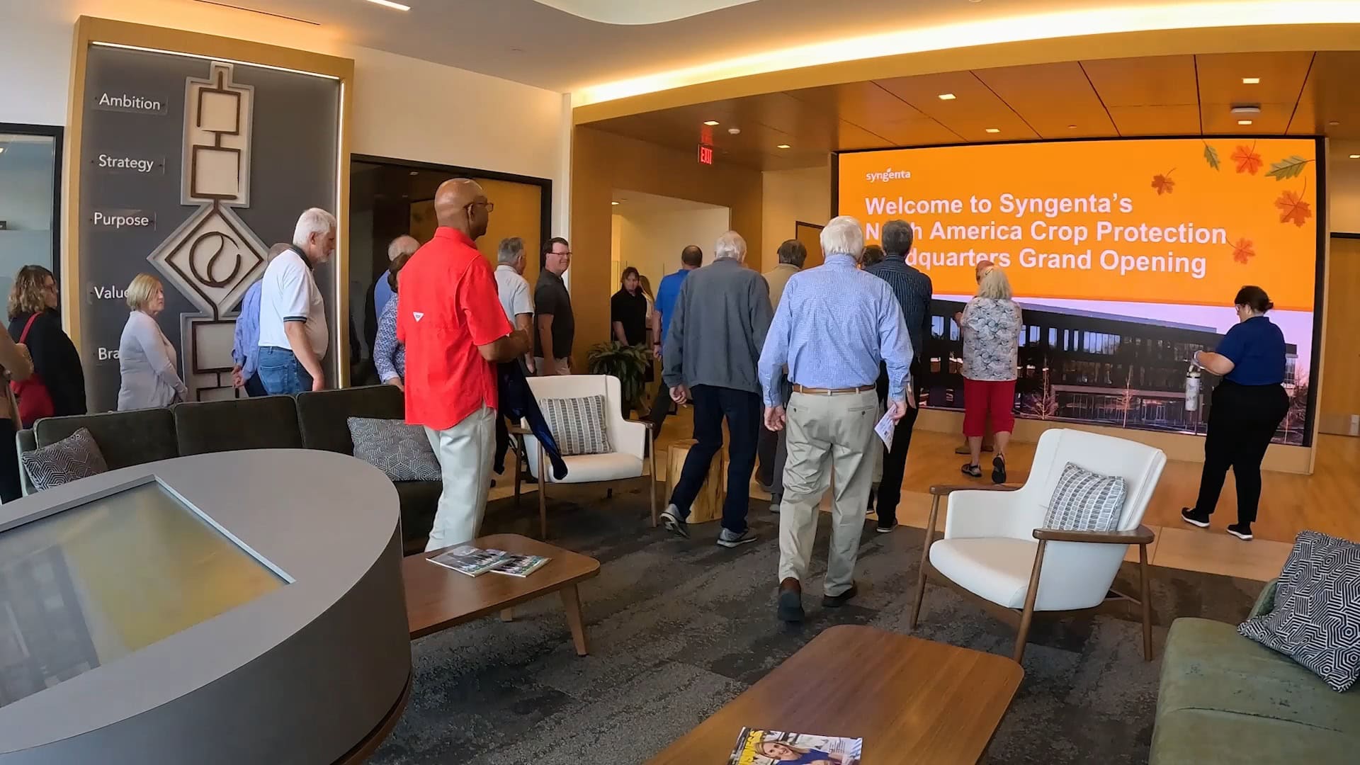 Syngenta facility lobby with tour group