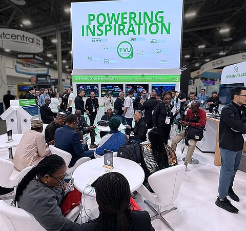 TVU Networks 30x30 exhibit at NAB 2025 - LED wall and meeting tables