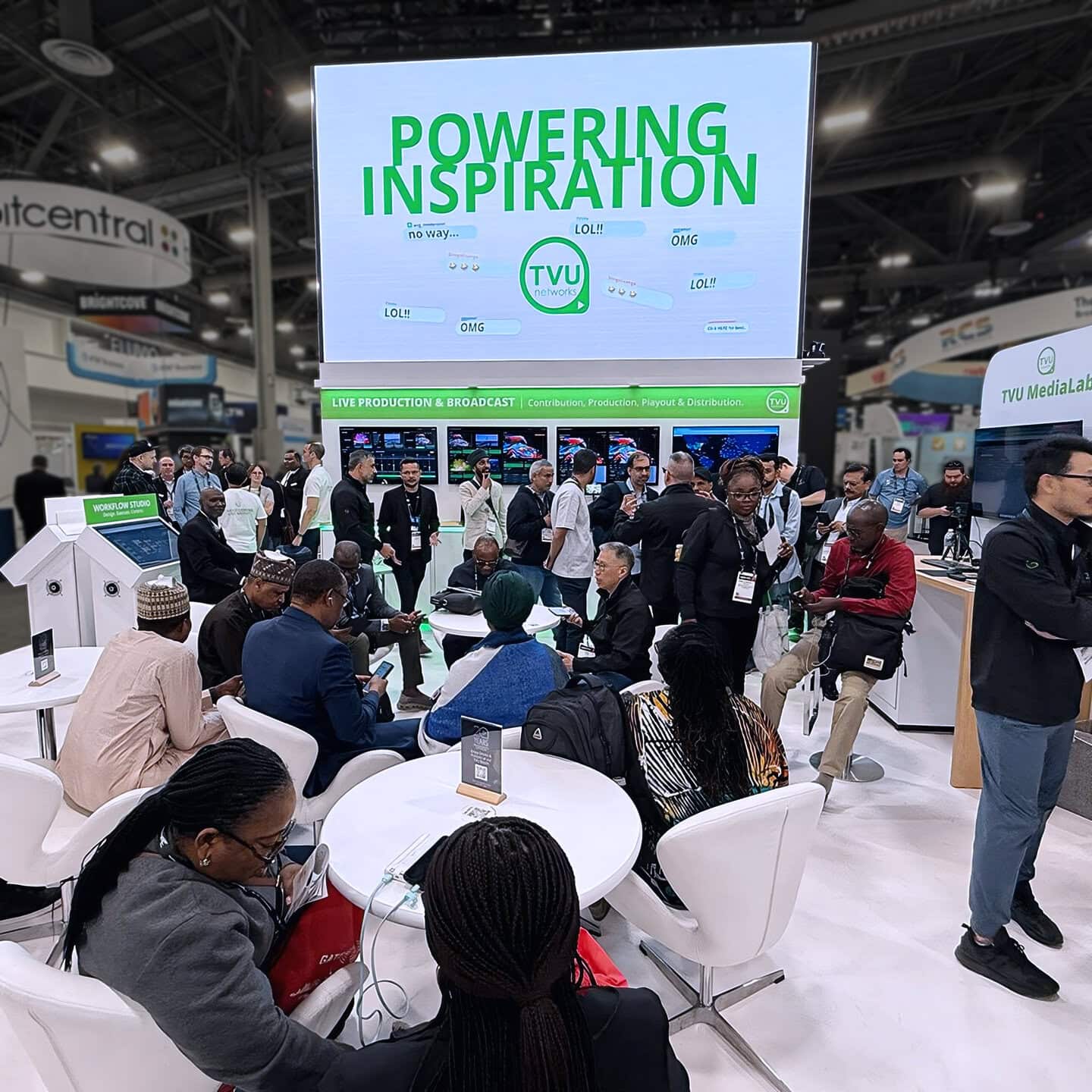 TVU Networks 30x30 exhibit at NAB 2025 - LED wall and meeting tables
