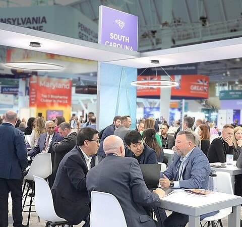 SCbio 20x50 trade show exhibit BIO 2025 - crowds of meetings