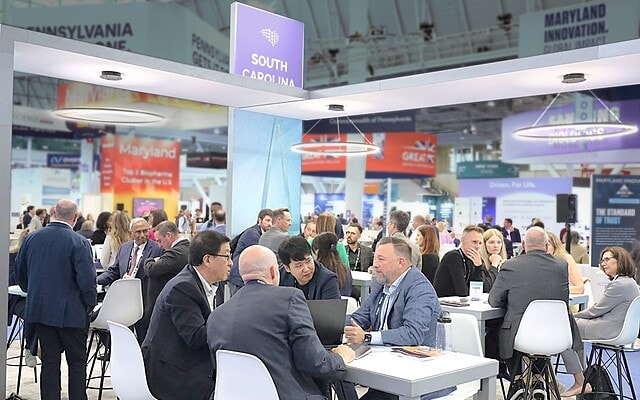 SCbio 20x50 trade show exhibit BIO 2025 - crowds of meetings